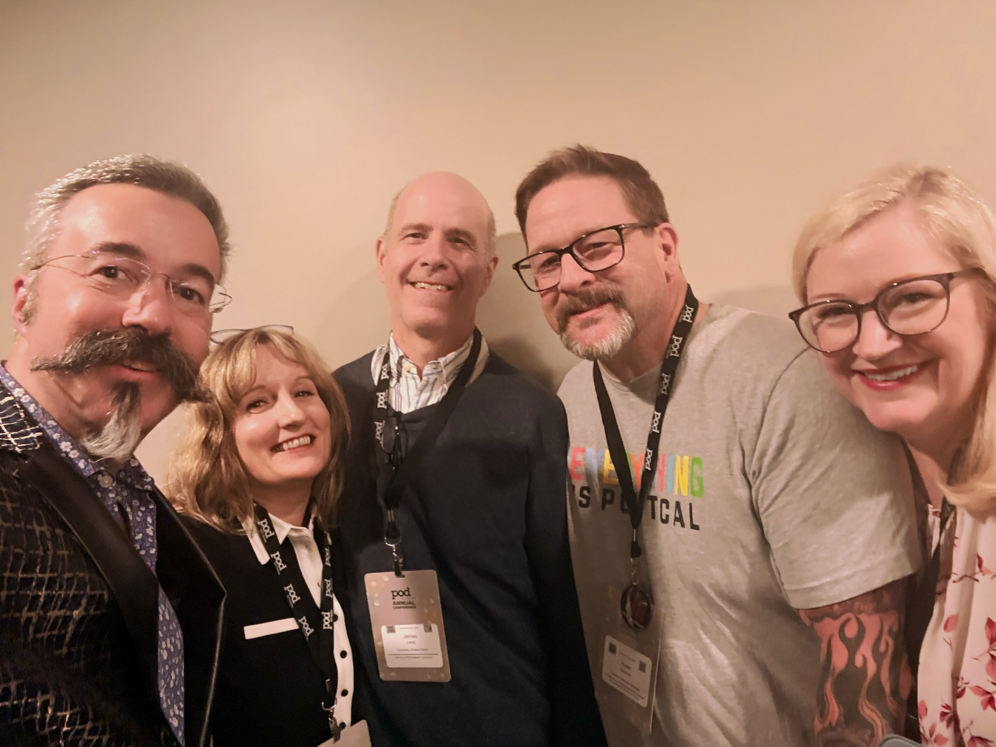 5 educational developers smile at the camera