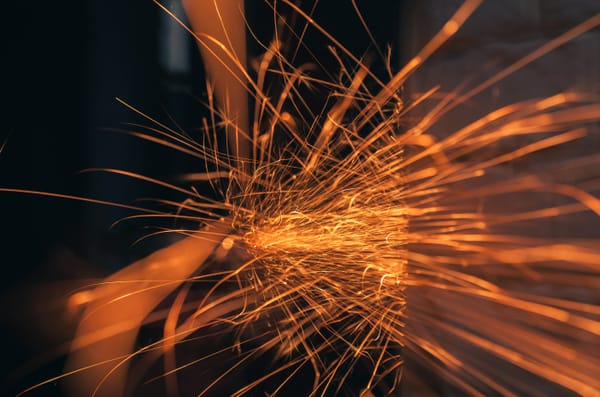 Bright sparks caused by metal against metal friction - I think?